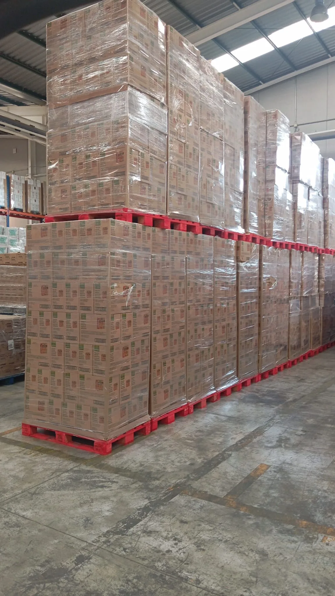 Double-stacked pallets in warehouse storage